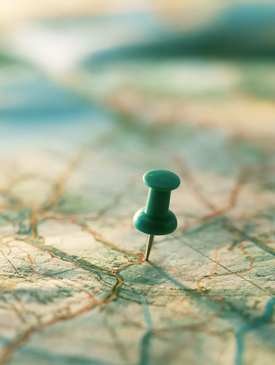 Pushpin marking a route on a paper roadmap, planning a personal loan decision